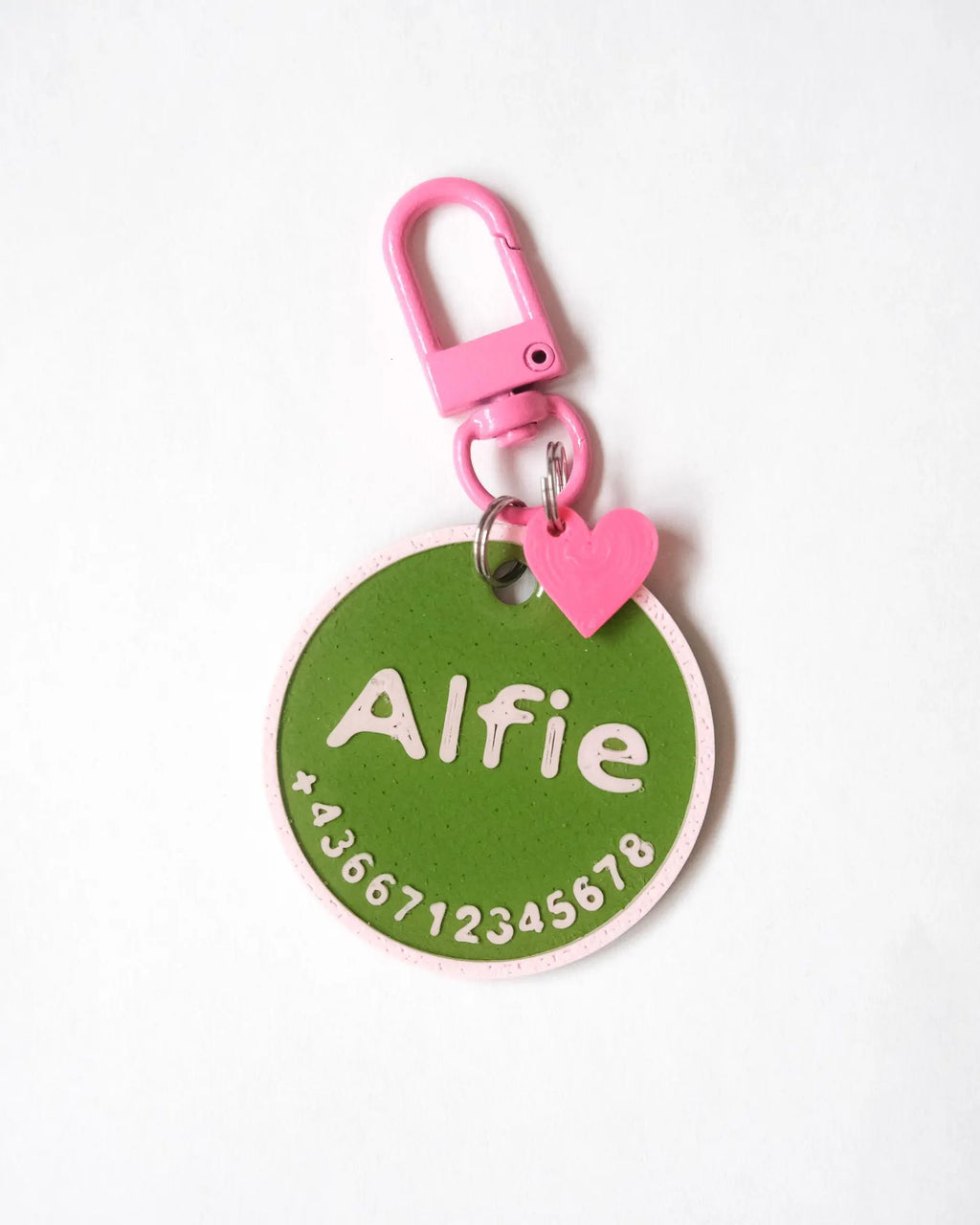 Alfie - Green tag with pink carabiner