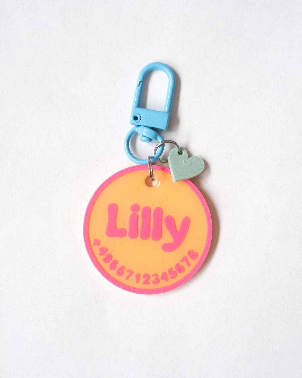 Lilly - Neon orange tag with hot pink and blue carabiner