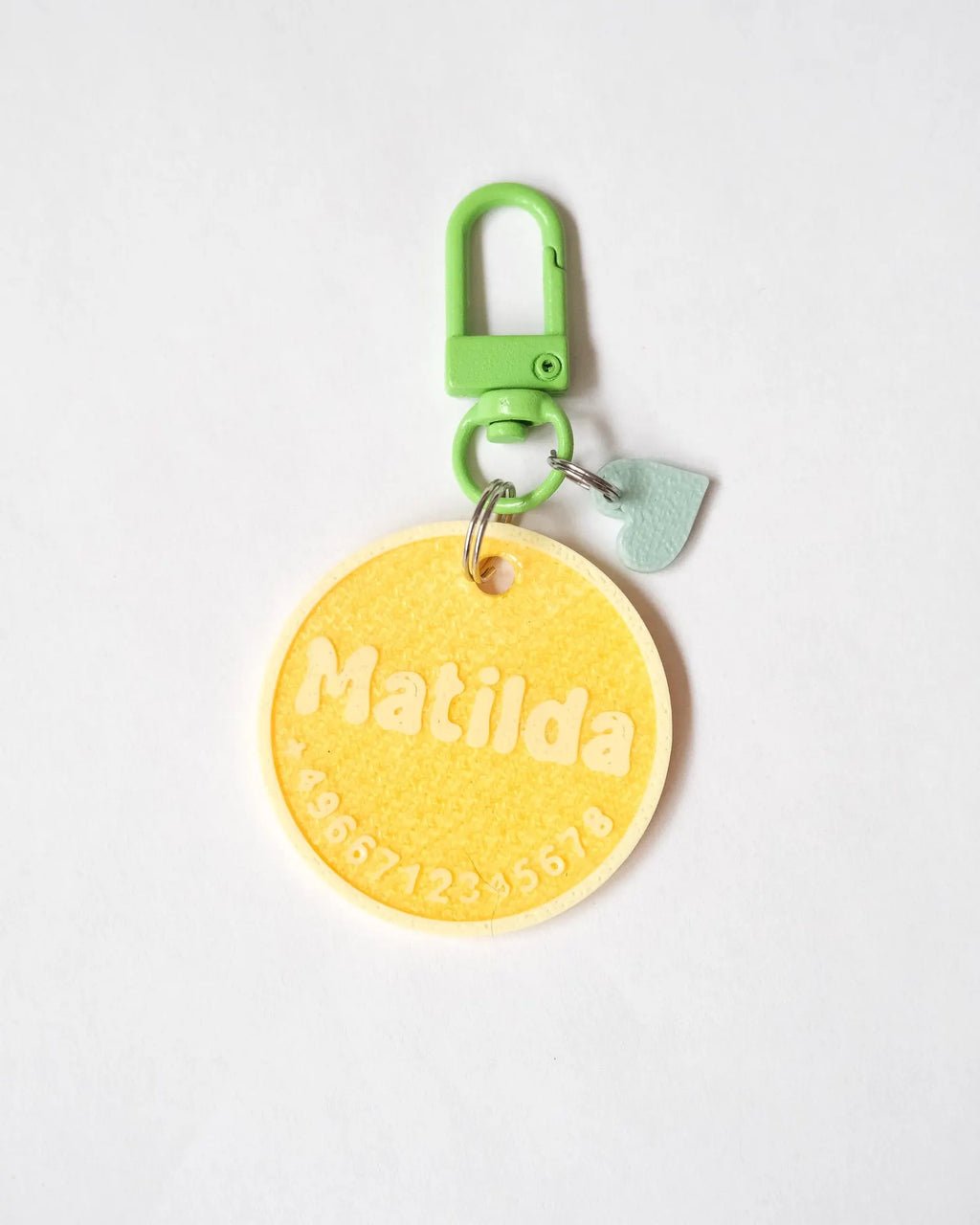 Matilda - Yellow tag with cream outline and green carabiner